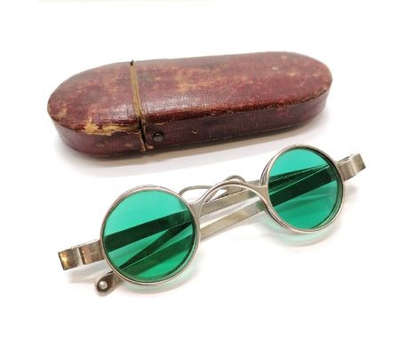 Unusual pair of antique silver marked green tinted double lens spectacles (with no obvious damage) in original red leather ca