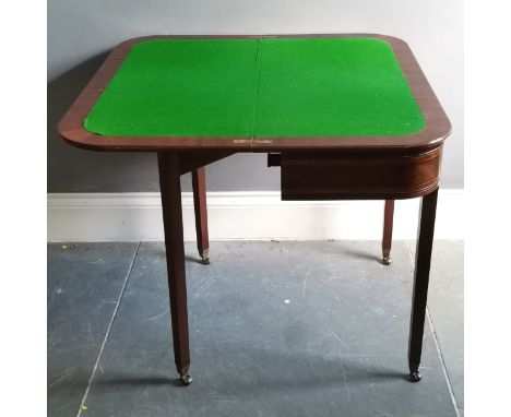 Reproduction mahogany fold over card table with inlaid &amp; marquetry drawer terminating on 4 brass casters - 72cm high x 81