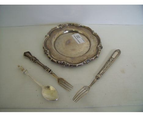 Birmingham silver hallmarked circular silver salva (diameter 14cm), a silver hallmarked handled pickle fork, another similar 