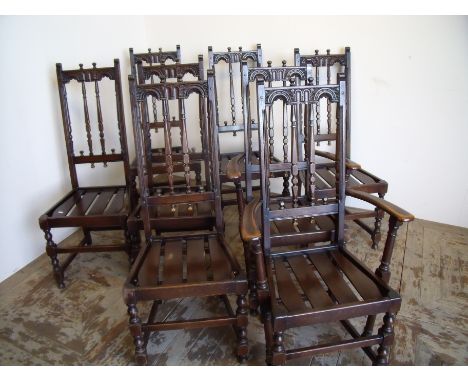 Set of eight (6+2) Ercol dark oak dining chairs with slatted seats 