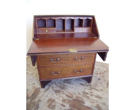 Edwardian mahogany inlaid bureau with fall front revealing fitted interior above three drawers on raised bracket feet (76cm x