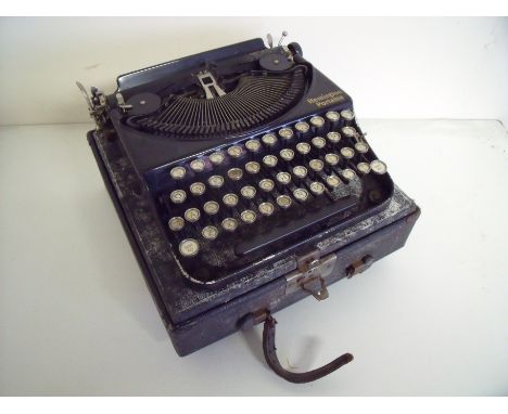 Cased Remmington Prestige portable typewriter 