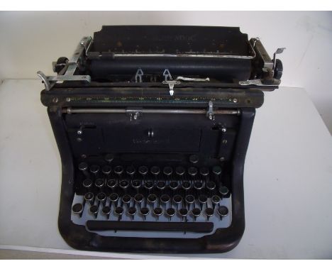 Vintage Underwood typewriter with cover 