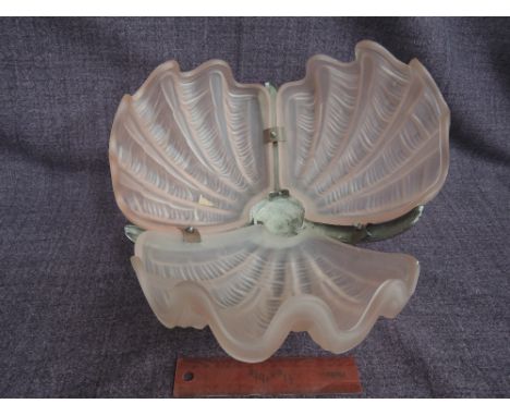 A 1930's Art Deco pink frosted glass triform ceiling light shades having chrome mount and two onyx table lamps 