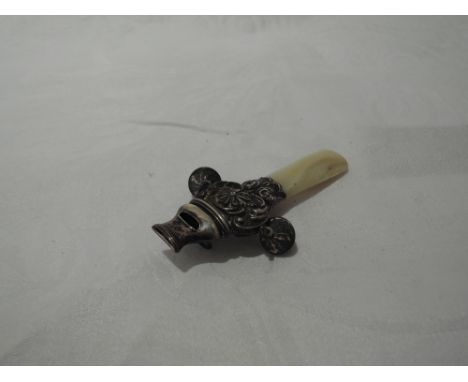 A baby's rattle having a mother of pearl teether, whistle and bells, Birmingham 1924, Crisford & Norris,GOOD CONDITION NO VIS