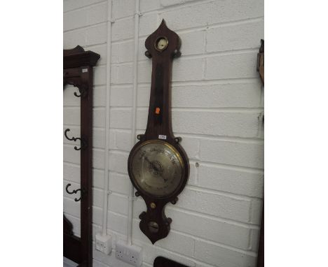 A 19th Century rosewood wheel braometer having humidity and level scales