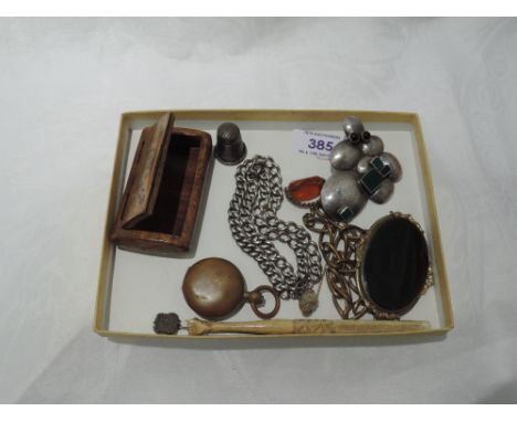 A small selection of jewellery and misc including burr wood snuff box, sovereign case, a bone stanhope modelled as a clenched