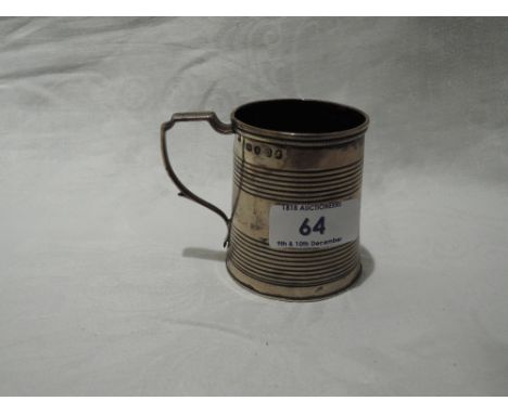 A Georgian silver miniature tankard having reeded decoration to body, monogram to front and architectural handle, London 1819