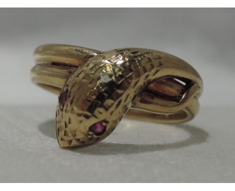 A 9ct gold Serpent ring having ruby set eyes, size VCONDITION REPORT  Approx 5.5g