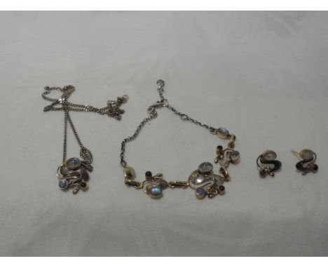 A silver and gold plated pendant, earrings and bracelet set by Paula Bolton in the Monet design having moonstone and Iolite d