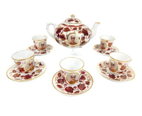 19th century miniature Russian tea set comprising; a teapot, 5 x cups and 5 x saucers, all decorated with hand-painted red vi