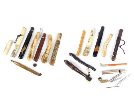 A collection of Japanese opium pipes, pipe holders and similar items, to include a bone pipe holder carved with a horse, 20 x