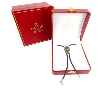 An American rubber boot lace lariat necklace with 18 ct white gold fastening and heart-shaped ends, with a large white gold a
