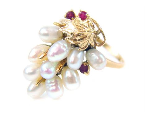 A vintage 14 ct yellow gold ruby and rice pearl cocktail ring in the form of a bunch of grapes, Weight 3.30 g