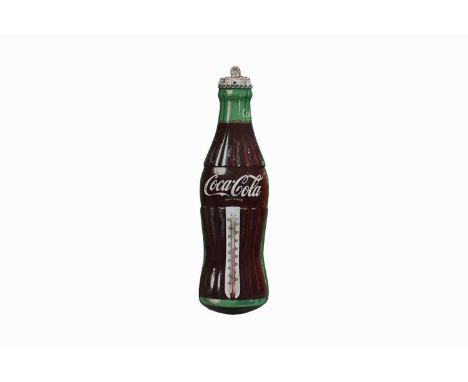 A vintage Coca-Cola Thermometer, in the form of a glass cola bottle, marked 'TCA Made in U.S.A' to the base, with having loop