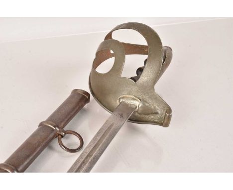 An Italian M1888 Grenadier Officer's sword, having shaped wooden grip, etched single fullered blade, 74cm long blade, complet