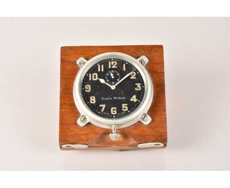 A French Military Cockpit Clock, named 'Aviation Militaire', having black dial with yellowish Arabic numerals, with small sub