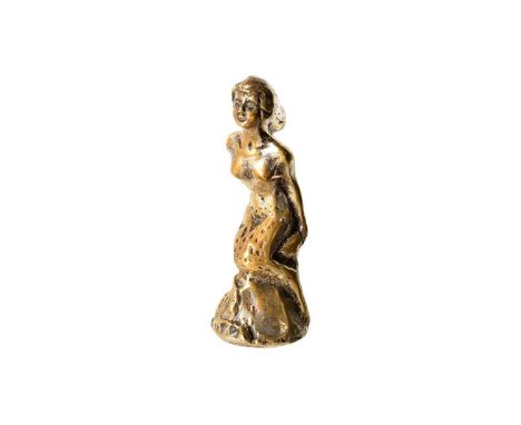 A vintage Mermaid Car Mascot, a heavy plated brass figure of a mermaid sitting on a rock, with signature to the back, possibl