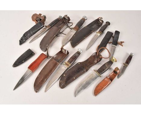 An assortment of Hunting Knives, to include William Rodgers and Fagan, with sheaths (parcel) no postage for this lot, we can 