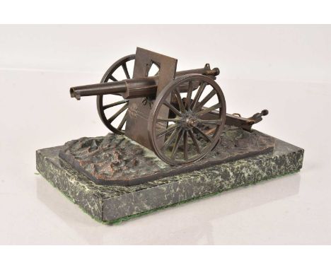 Ed Chachoin, bronze of an Artillery Gun, marked 1914-15, also marked 'Depose', on marble base, 17cm x 9cm