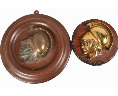 Two heavy metal Ships Badges, both in the form of a Greek Warrior, similar to HMS Ajax, one in bronze, the other in brass, mo