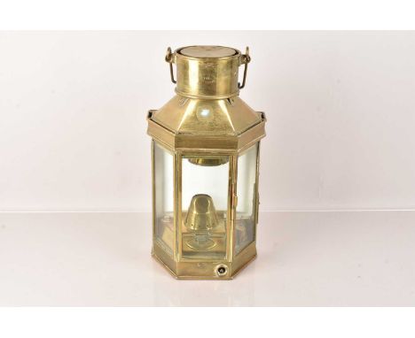 A Bullpit & Sons Brass Ship's Lantern, dated 1912, stamped to the top, complete with burner, 40cm excluding handle