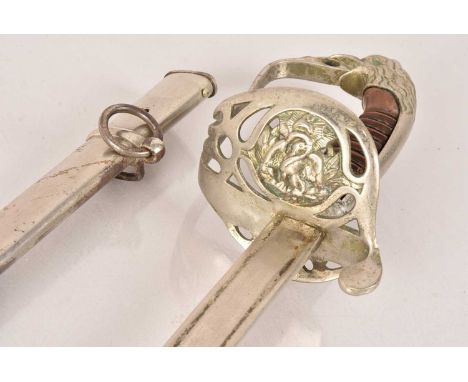 A Mexican 1845 Pattern Style Officer's sword, having falcon pommel, wooden grip, with design to guard, complete with scabbard