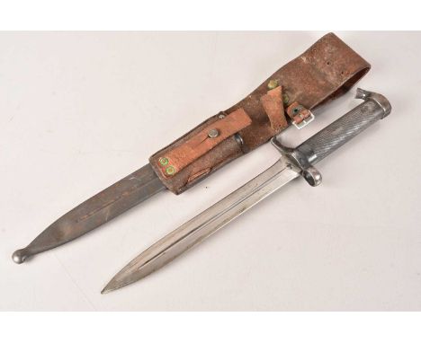 A Swedish m1896 Bayonet, the cross guard have unit markings, complete with scabbard and leather frog