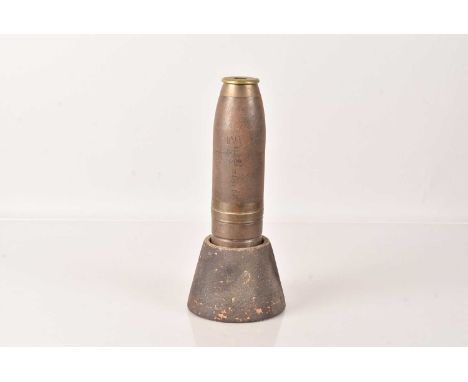 A WWI Naval Round, stamped '4.2 INT 6P P.Co 1916' to the side, also stamped with a broad arrow and 'N' for Naval, 5.5cm/2 1/4