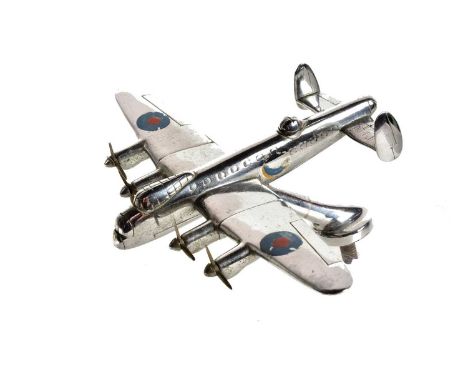 A Vintage Avro Lancaster Car Mascot, nickel plated, with four rotating propellers and decals, 13.5cm from nose to tail
