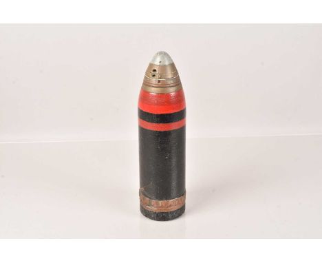An Inert Round with Timer Fuse, 8cm diameter, the fuse marked with a broad arrow, also with the numbers '21' and '19'