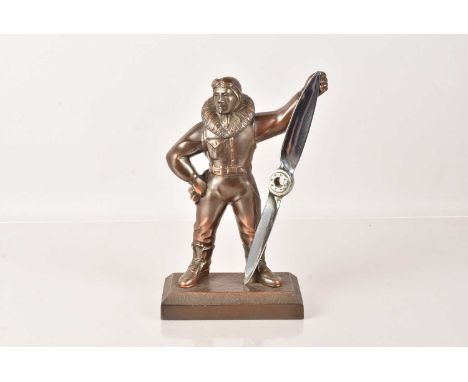 An RAF Pilot Table Lighter, in the form of a pilot holding a propeller, head hinged to the back, 23.5cm H