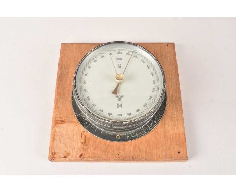 A WWII German Kriegsmarine Bulkhead Barometer by Lufft, having a black Eagle and Swastika above a letter 'M', stamped 2095/ob