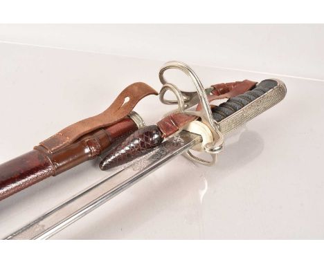 A Presentation Sword by Wilkinson, awarded for Royal Military College 2nd Prize for Mechanics, Gentleman Cadet A.K.Woods, Jul