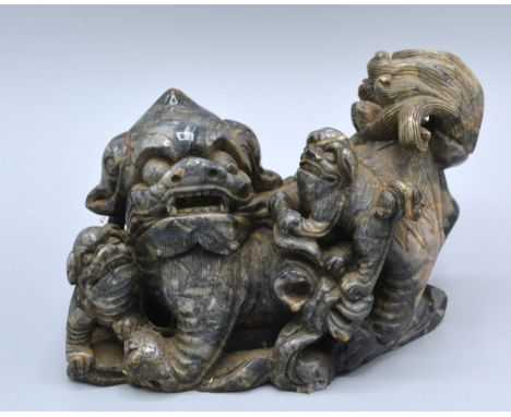 A Chinese Carved Soapstone Model Of A Dog Of Fo 11 cms tall 