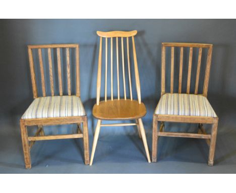 An Ercol Elm And Beech Stick Back Chair together with a pair of 19th Century side chairs 