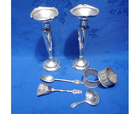 A GEORGE III SILVER BRIGHT-CUT CADDY SPOON with pierced bowl, a pair of loaded silver posy vases, and other silver and white 