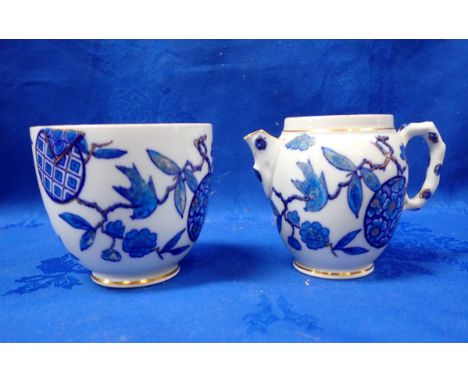 A TAYLOR, TUNNICLIFFE AESTHETIC MILK JUG AND SUGAR BASIN in underglaze blue (chipped spout)