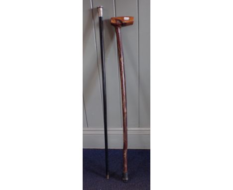 A HALLMARKED SILVER-TOPPED WALKING CANE and a 'hedgerow' walking stick (2)