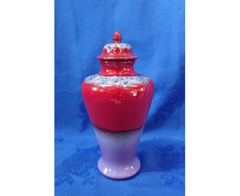KAREN R. FORD FOR POOLE POTTERY, A VASE AND COVER 25cm high 