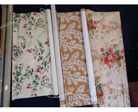 A QUANTITY OF ROLLER BLINDS plain and floral, some boxed