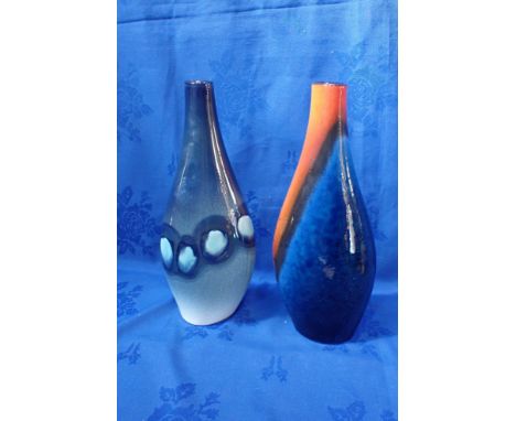 A POOLE POTTERY OCEAN ASYMMETRICAL TWIST VASE with another, 33cm high 