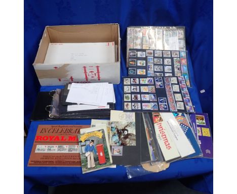 A COLLECTION OF FIRST DAY COVERS some in an album