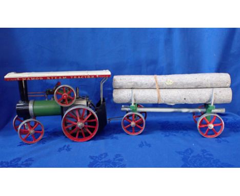 A MAMOD STEAM TRACTOR, AND LOG WAGGON (un-boxed)(canopy supports damaged)