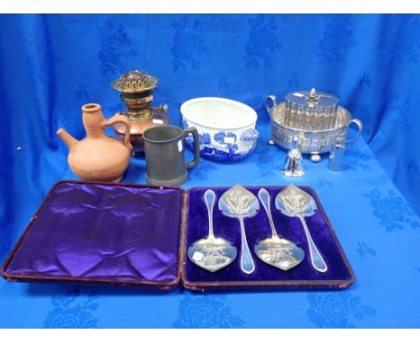 W.A.S. BENSON: AN ARTS AND CRAFTS COPPER AND BRASS OIL LAMP a cased set of silver-plated servers, and other items