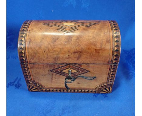 A VICTORIAN WALNUT AND PARQUETRY TEA CADDY with domed top 