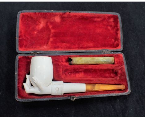 A CARVED MEERSCHAUM PIPE cased