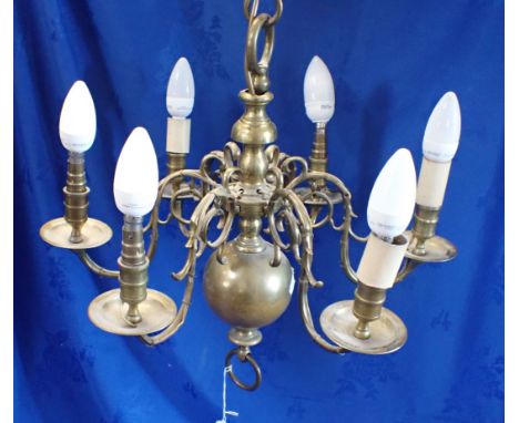 A SIX-BRANCH DUTCH STYLE BRASS CHANDELIER of 17th century design, fitted for electricity