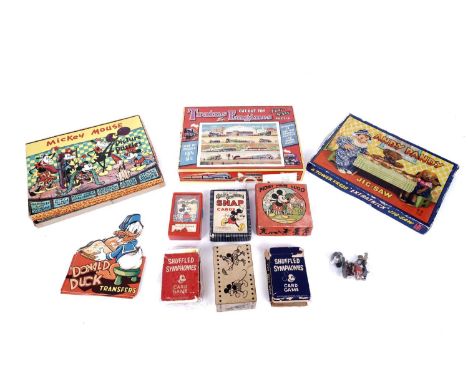 A selection of jigsaws, playing cards and puzzles, to include: Mickey mouse picture puzzles; Mickey Mouse ludo; Mickey Mouse 