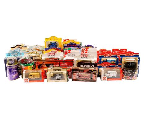 A selection of diecast model vehicles, many advertising vehicles, including: The Darling Buds of May; Dad’s Army; H. Samuel; 